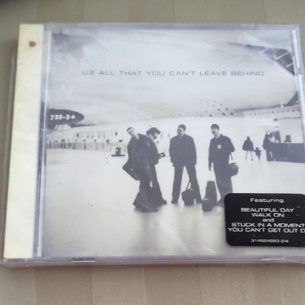 All That You Can't Leave Behind CD - White Cover